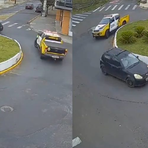 Carro “brinca” com viatura em rotatória durante perseguição